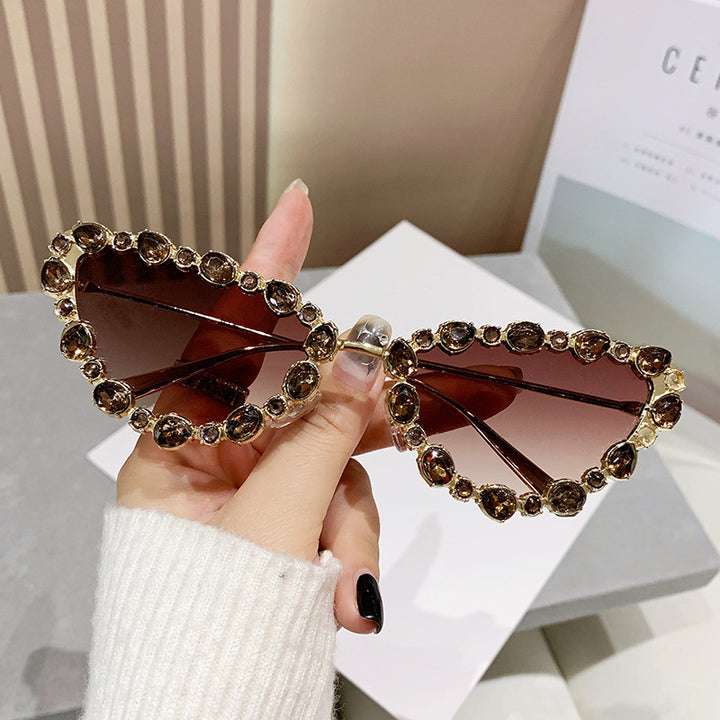 Ladies elegant Cat-Eye sunglasses with glamorous stone setting Stornfield