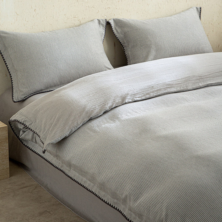 Linen-Cotton duvet cover set with fine striped texture and decorative trim