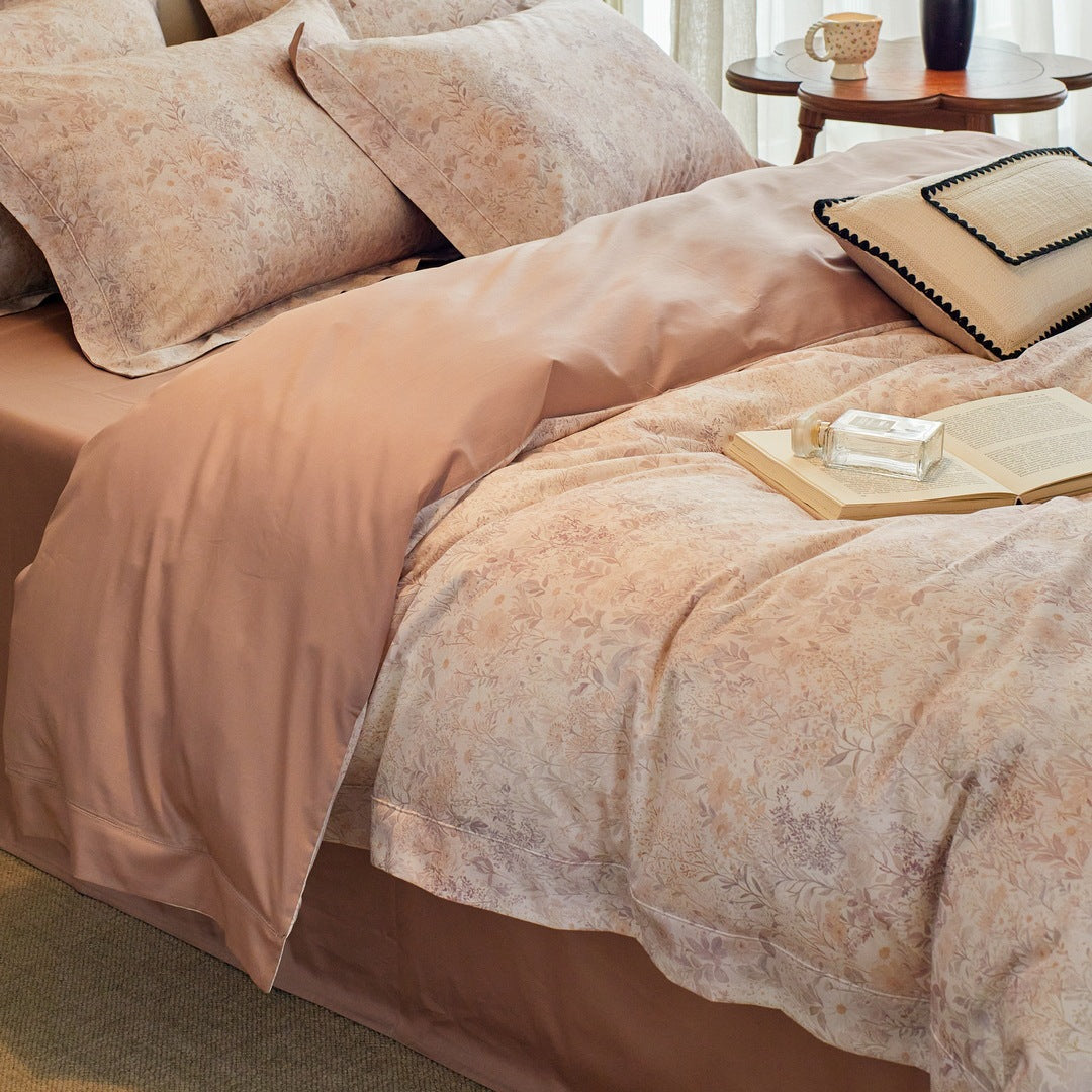 Luxurious cotton satin bed linen set with millefleurs floral pattern and fine piping