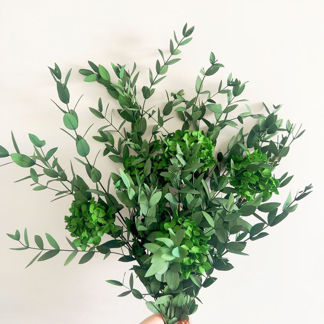 Lifelike Floral Bouquet with Green Foliage