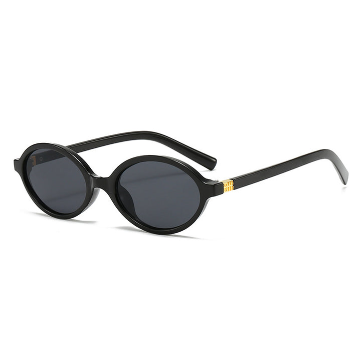 Women's fashionable oval glasses with golden accents Stornfield