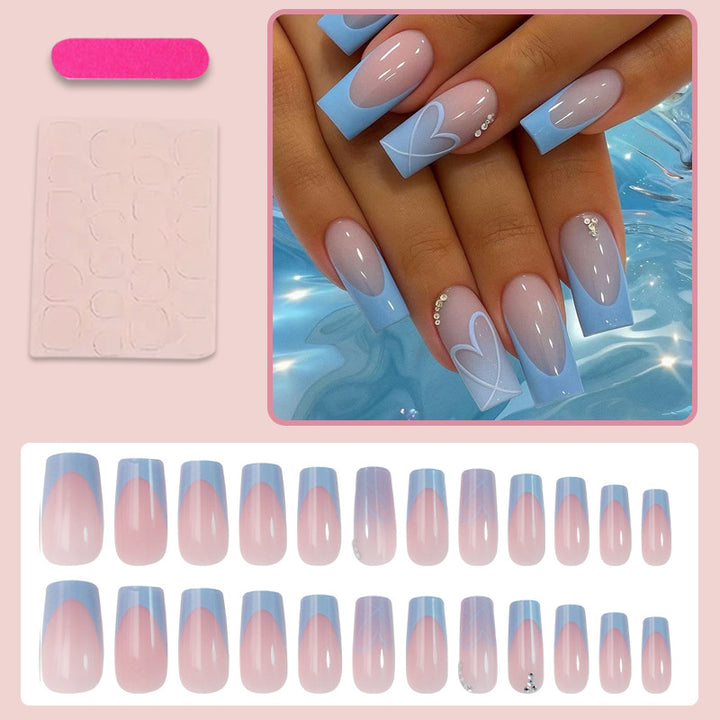 Artificial nail set with romantic heart designs and glamorous accents Stornfield
