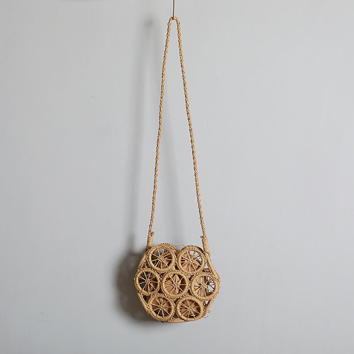 Shoulder bag made of handwoven raffia with intricate embellishments Stornfield