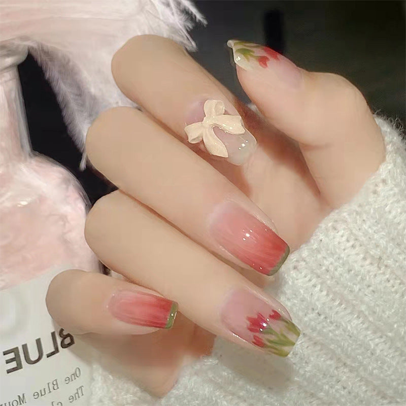 Stylish art false nails with heart design and glitter Stornfield