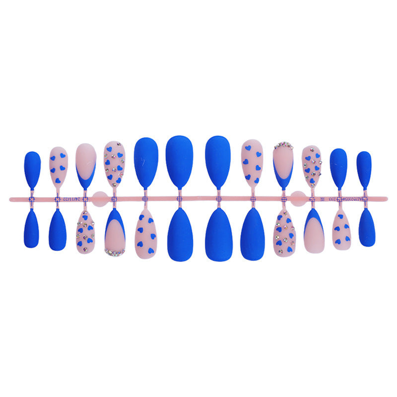 Nail art set with heart design and glitter accents Stornfield
