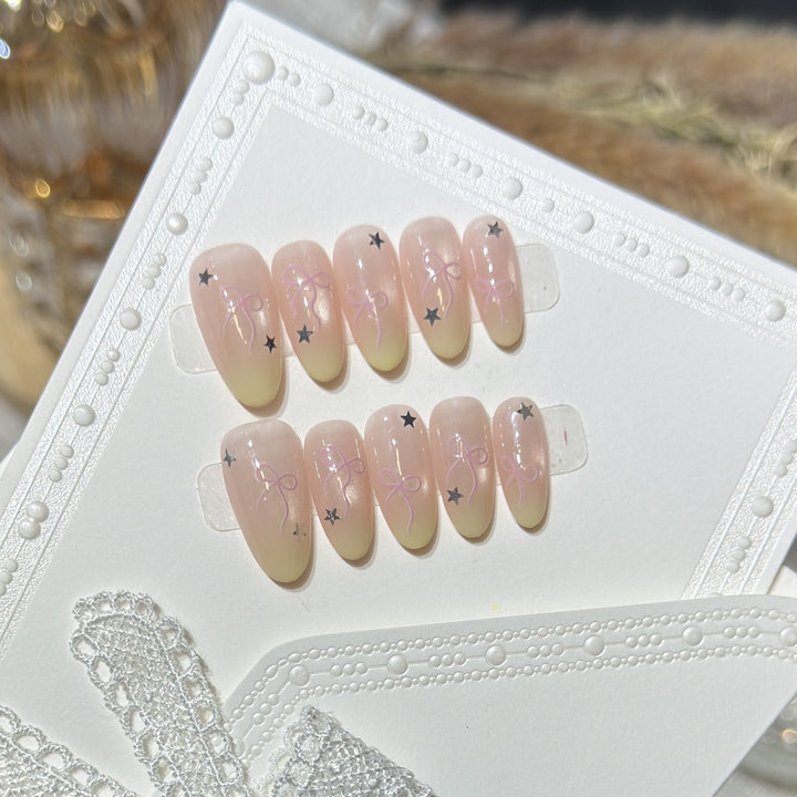 Press-On Nail Set with Bow and Star Accents Stornfield