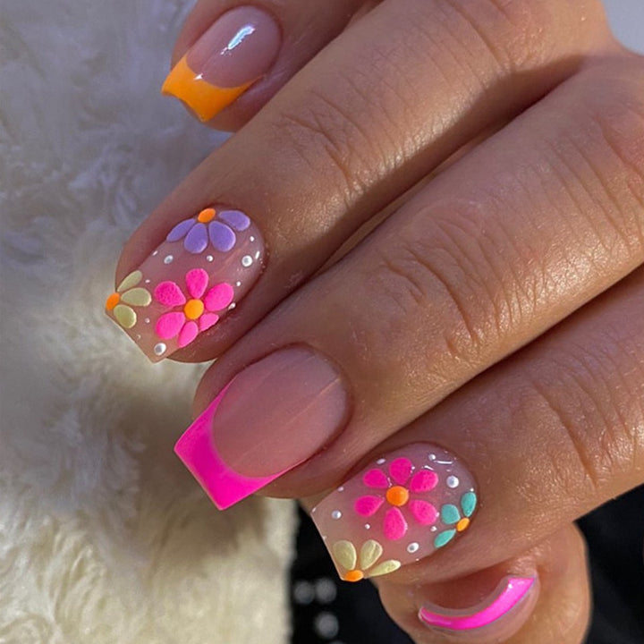 Artificial nail set with colorful flowers and creative French design Stornfield