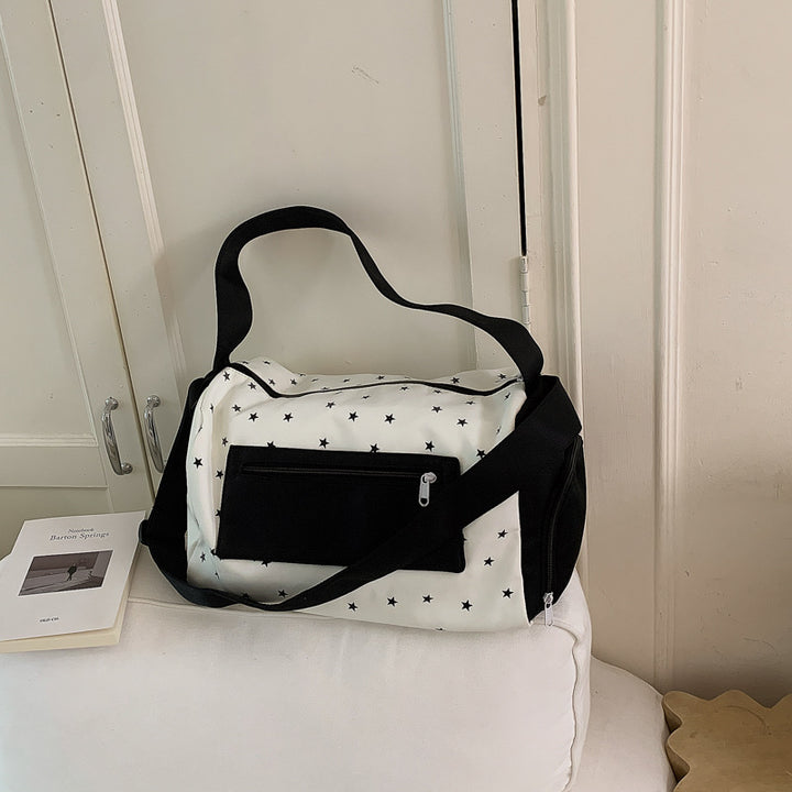 Sporty shoulder bag with practical slip pockets Stornfield