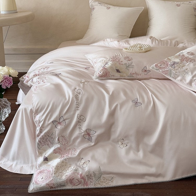 Luxurious cotton satin bedding set with floral embroidery and lace trim