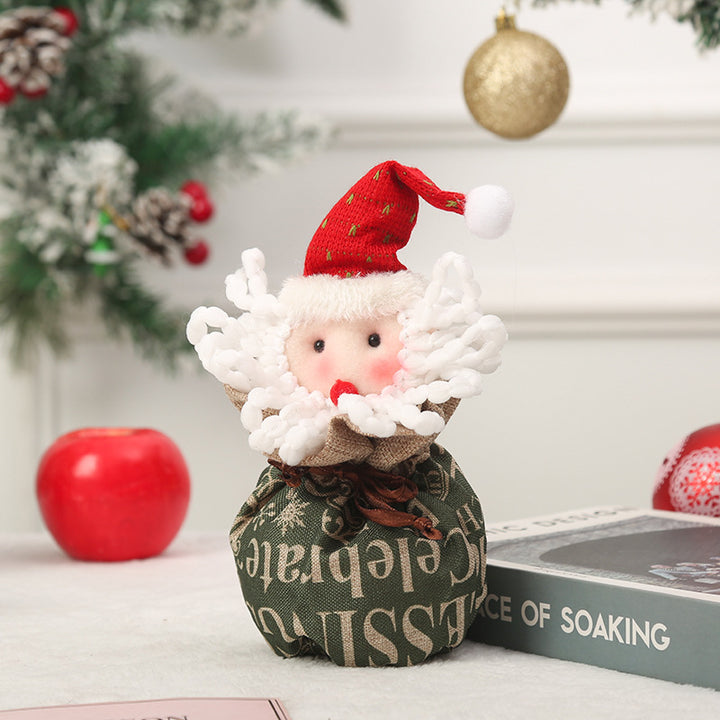Cute Christmas gnome with gift sack Stornfield