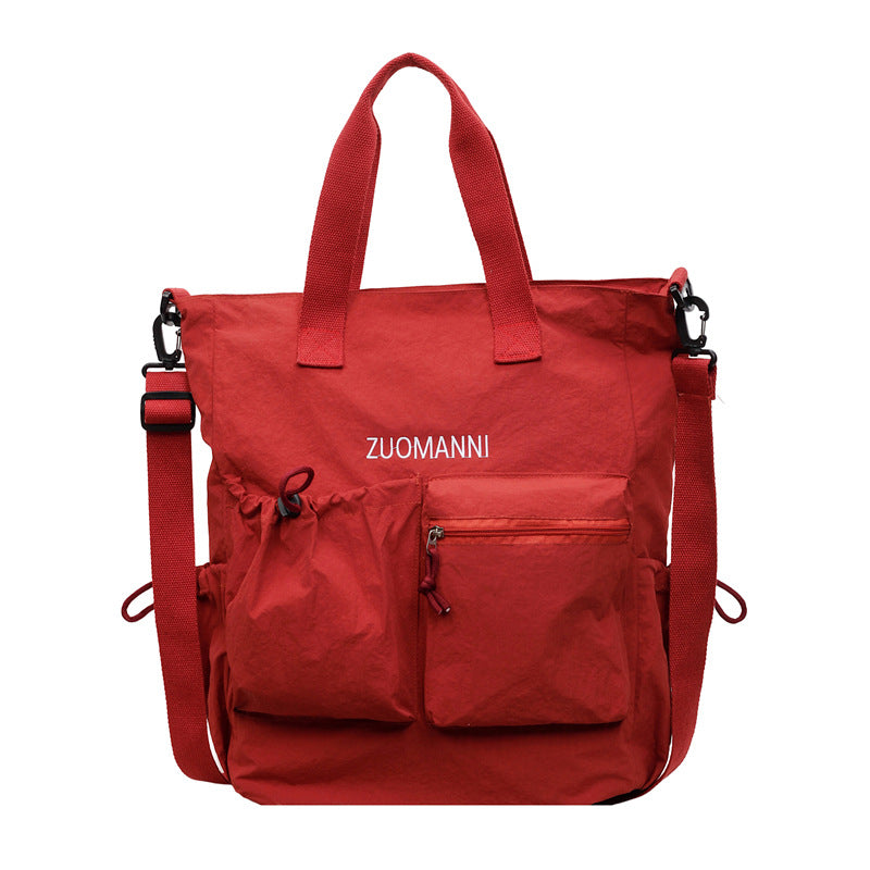 Tote bag with multifunctional outer pockets and adjustable shoulder strap Stornfield