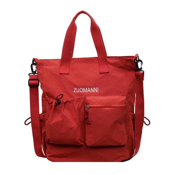 Tote bag with multifunctional outer pockets and adjustable shoulder strap Stornfield