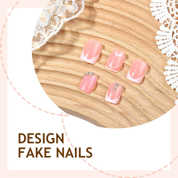 Artificial nail set with glitter and heart motifs Stornfield