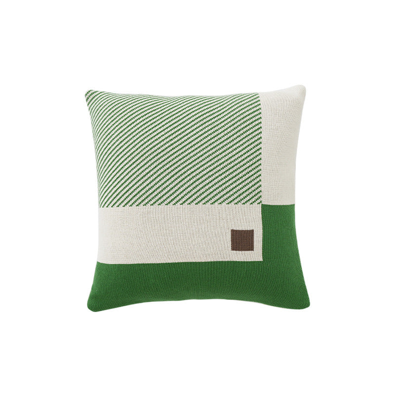 decorative knitted pillow with geometric check pattern