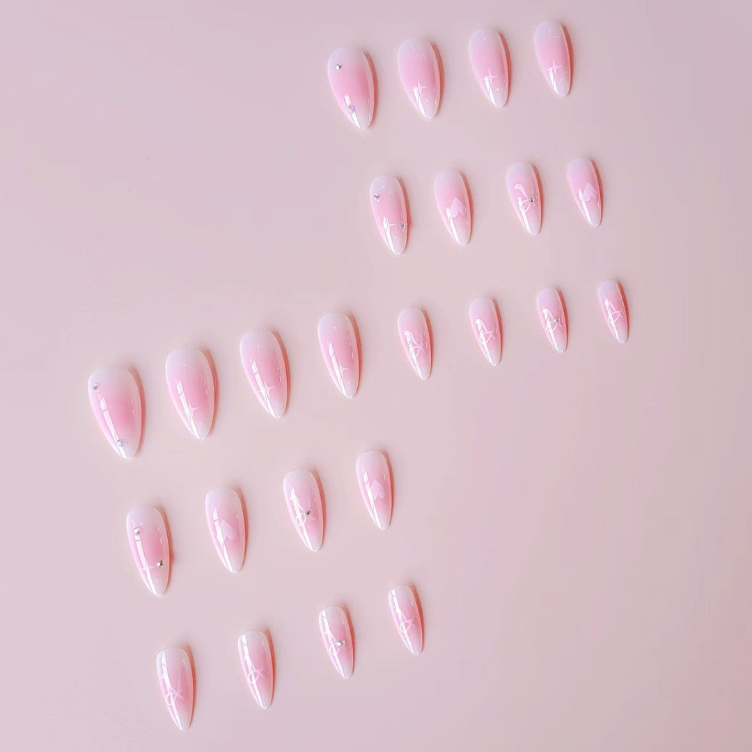 Artificial nail set with romantic heart design and embellished accents Stornfield