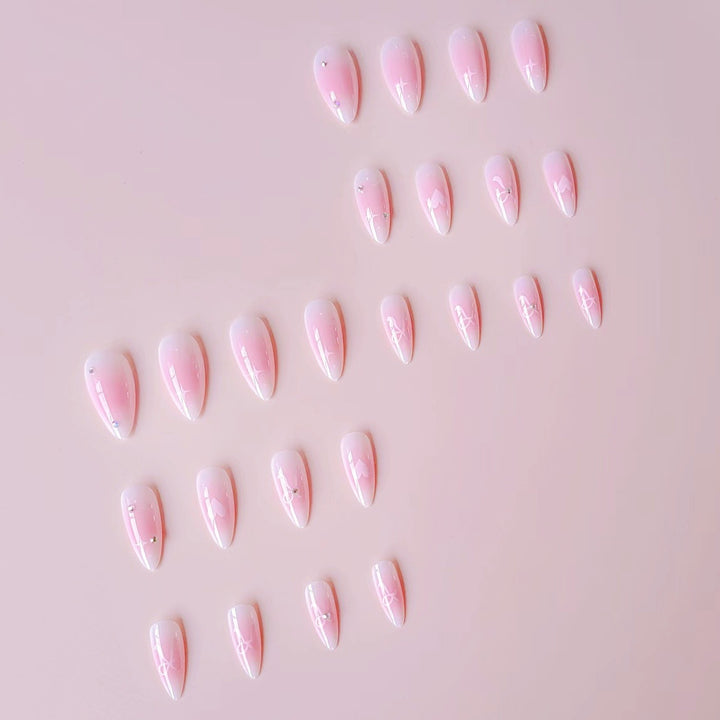 Artificial nail set with romantic heart design and embellished accents Stornfield