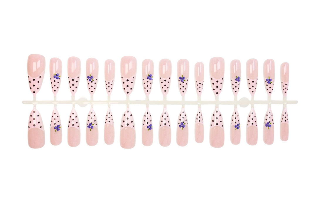 Acrylic nail set with stylish dots and floral embellishments Stornfield