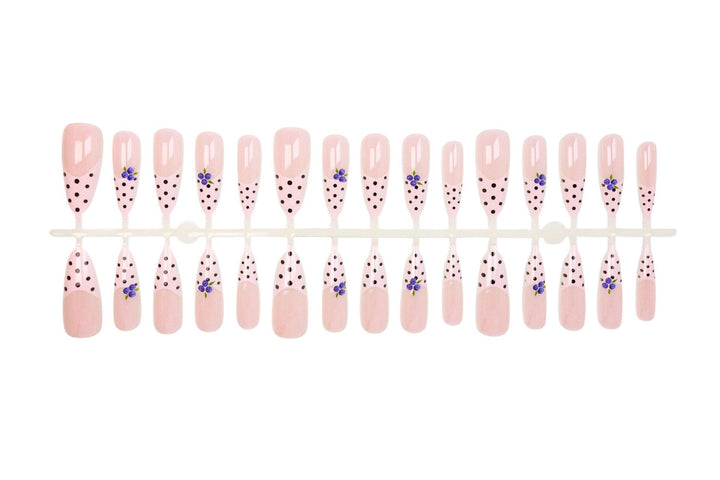 Acrylic nail set with stylish dots and floral embellishments Stornfield
