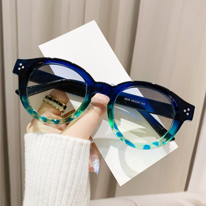 Ladies' fashionable sunglasses with clear and structured frame Stornfield