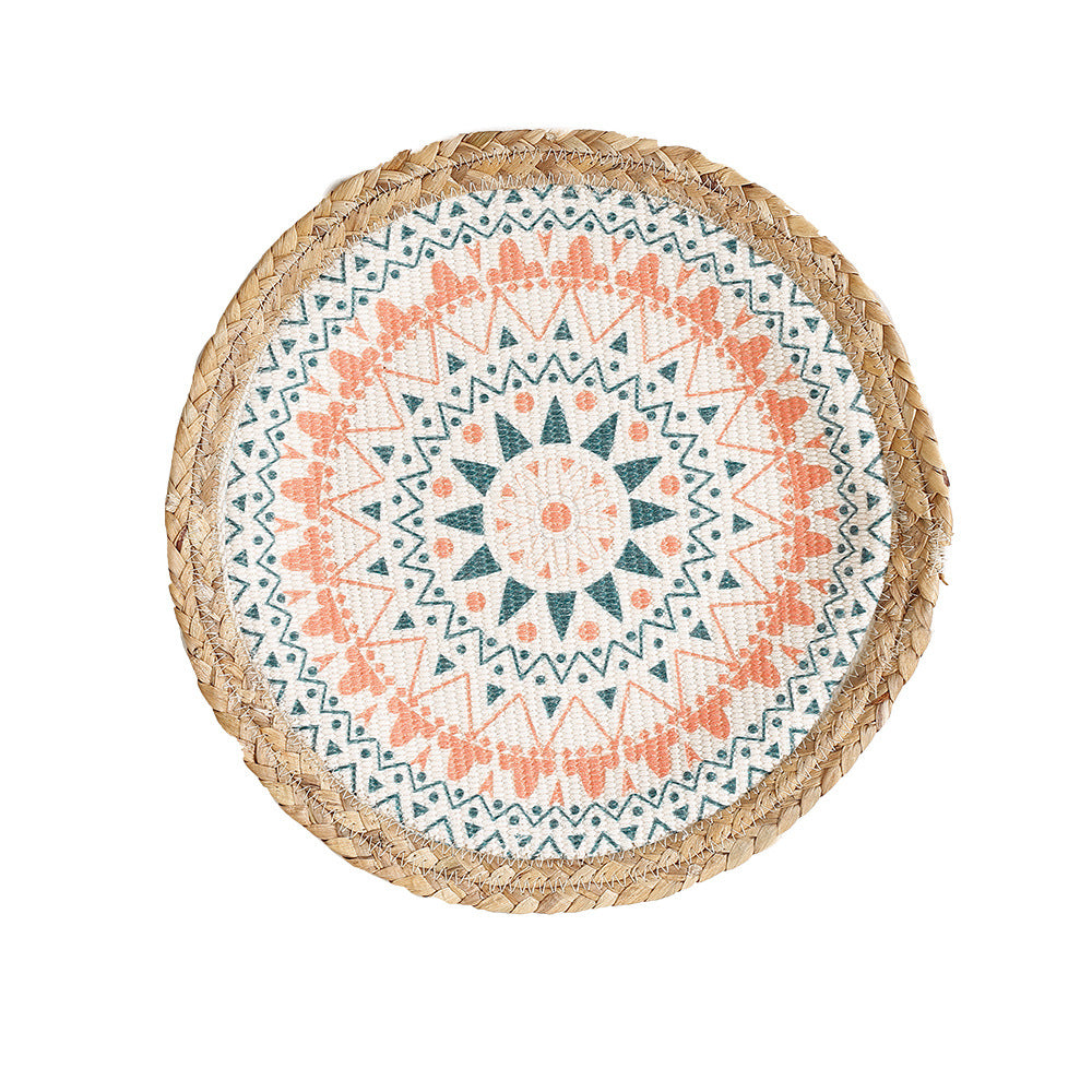 Beef seat pouf with mandala print, woven surface and braided jute edge