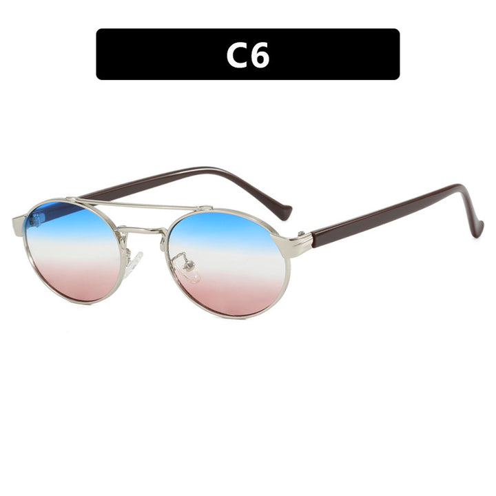 Ladies fashionable sunglasses in stylish round design with golden accents Stornfield