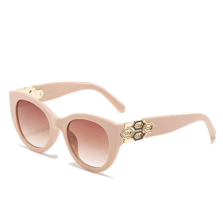 Fashion-Forward Cat-Eye Sunglasses with Decorative Accents Stornfield