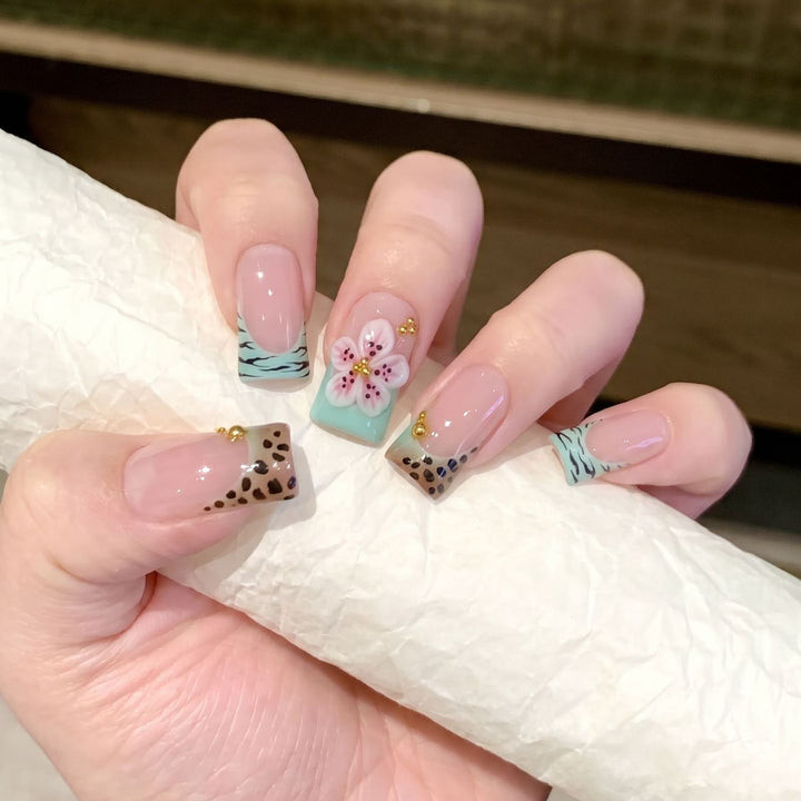 Artistic Press-On Nail Set with Floral and Patterned Design Stornfield