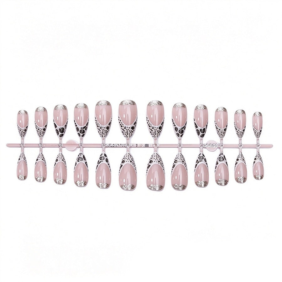 Exquisite artificial nail creation with glitter and unique design Stornfield