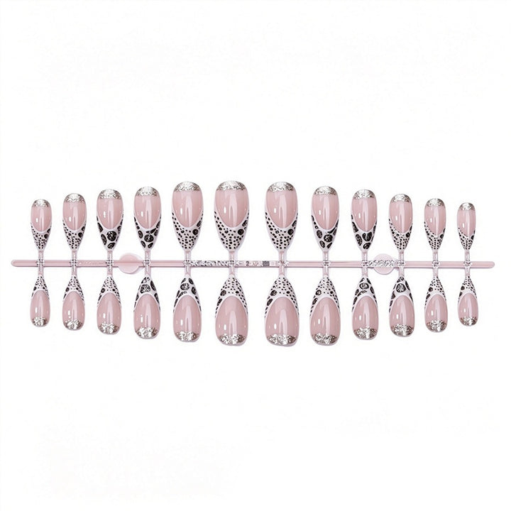 Exquisite artificial nail creation with glitter and unique design Stornfield