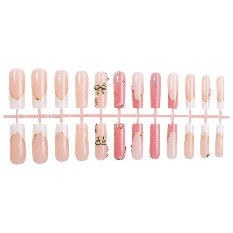 Acrylic nail set with elegant glitter and 3D accents Stornfield