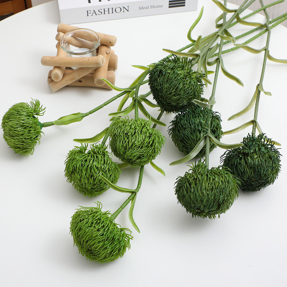 Decorative artificial flower branch with a natural appearance