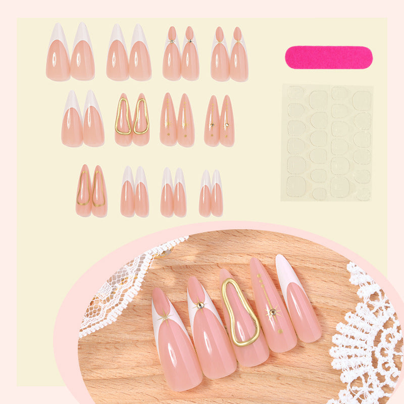 Acrylic nail set with glamorous rhinestones and decorative elements Stornfield