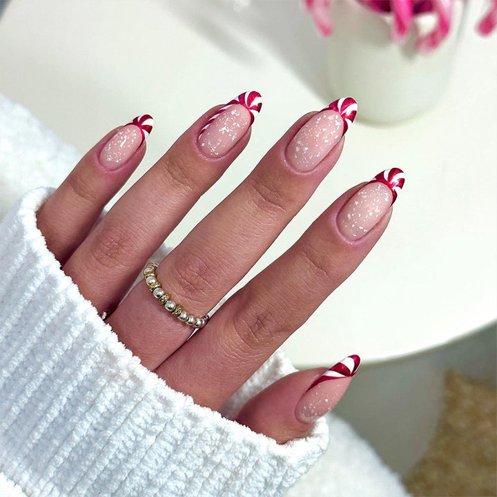 Artful stiletto nails with heart-shaped accents Stornfield