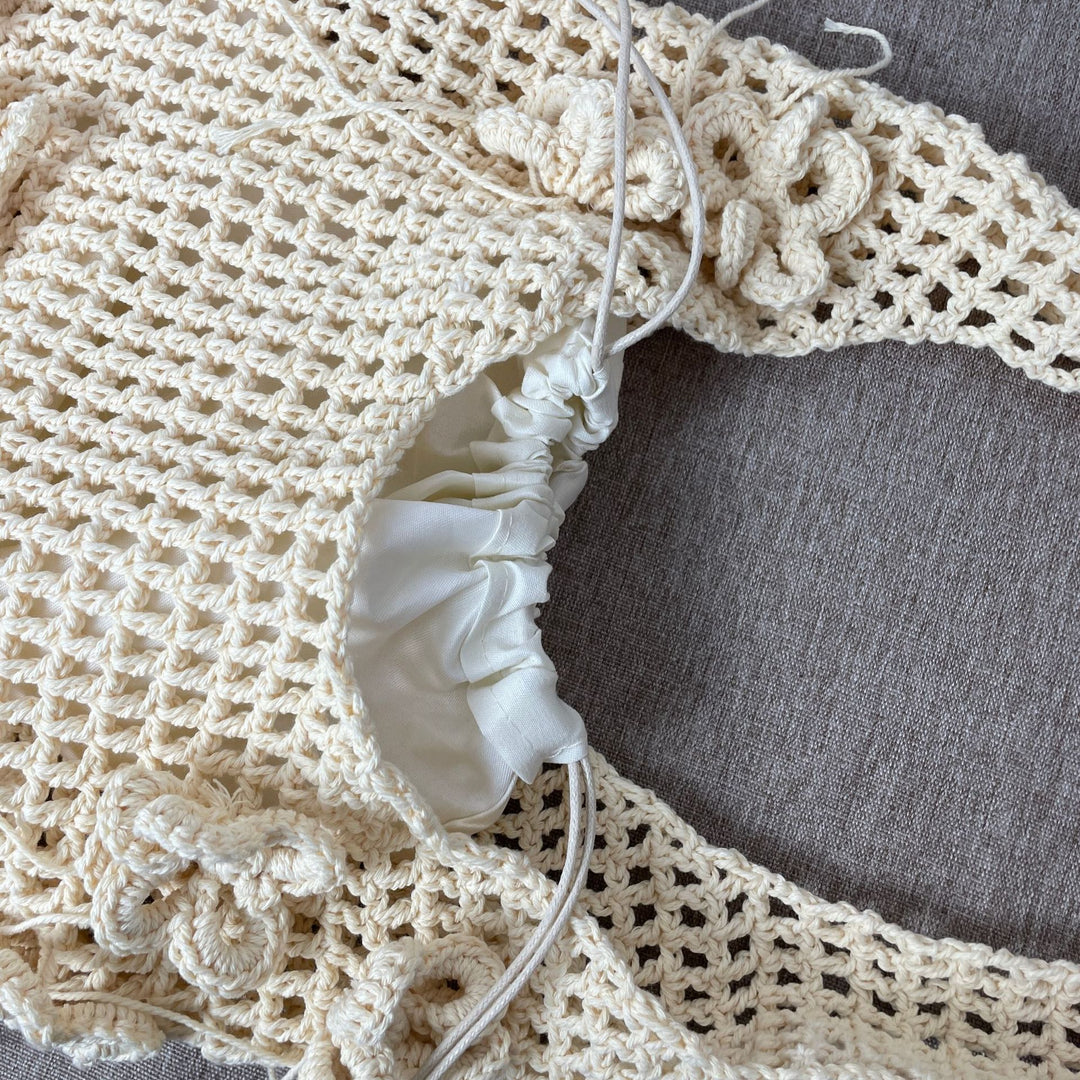 Hand-knotted beach bag with flower details Stornfield