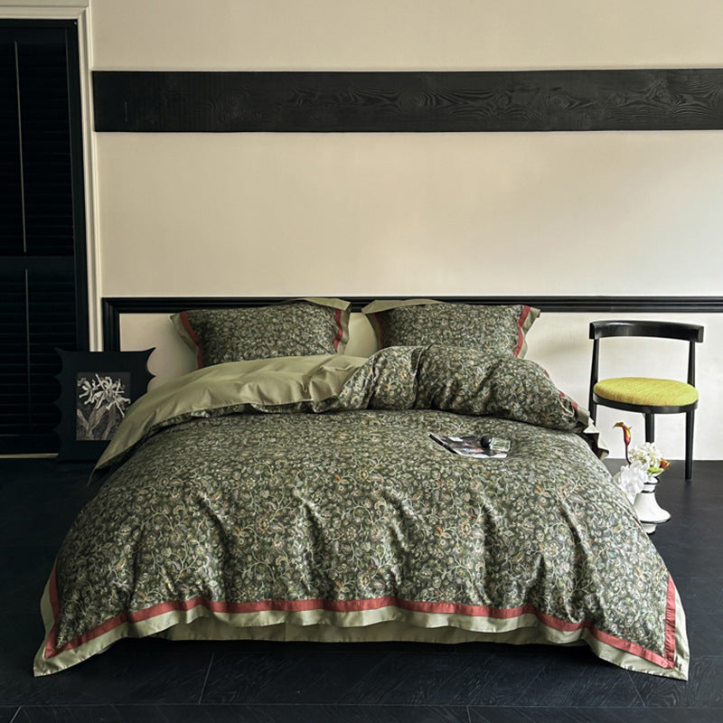 Reversible bedding set made of cotton satin with floral jacquard look and decorative hem