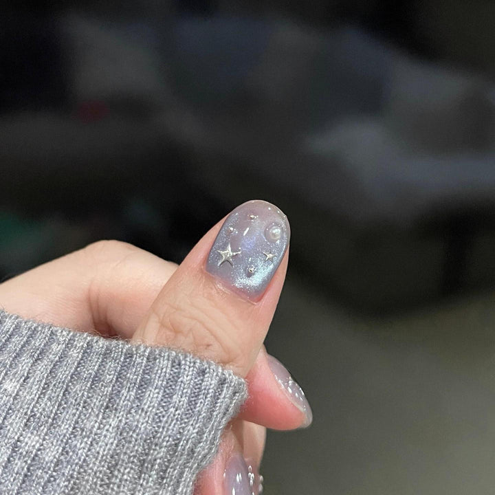 Artificial nails with shimmering star design Stornfield