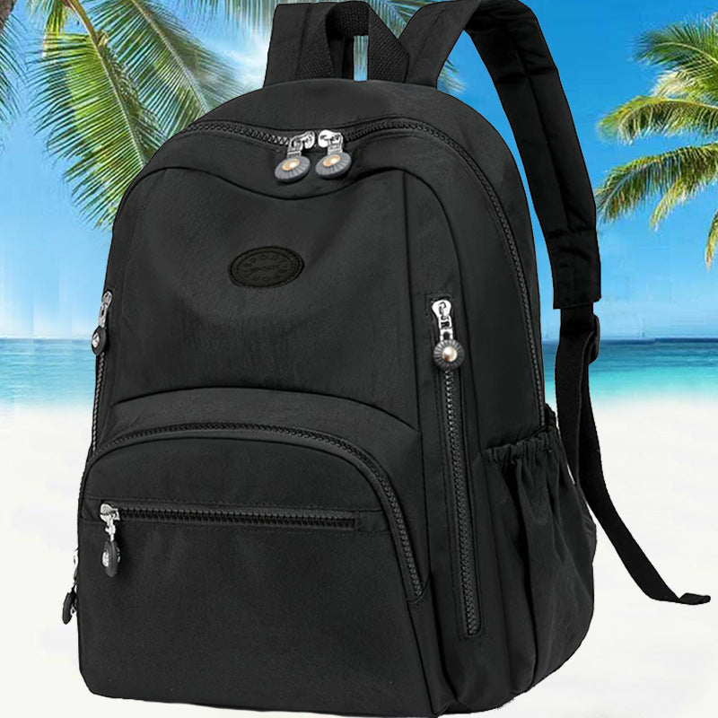 Multi-Pocket Travel Backpack with Water-Resistant Material Stornfield