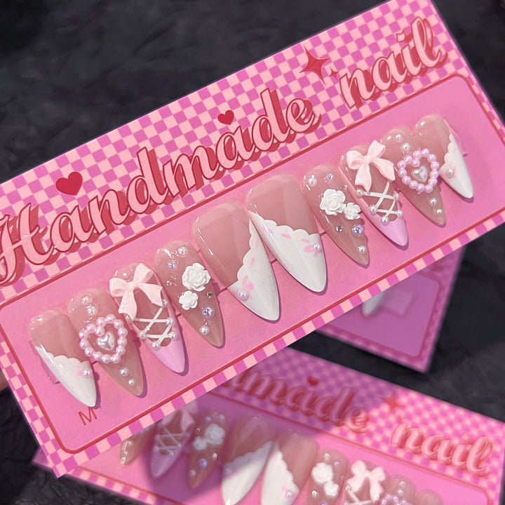 Artful stiletto nails with romantic accents Stornfield