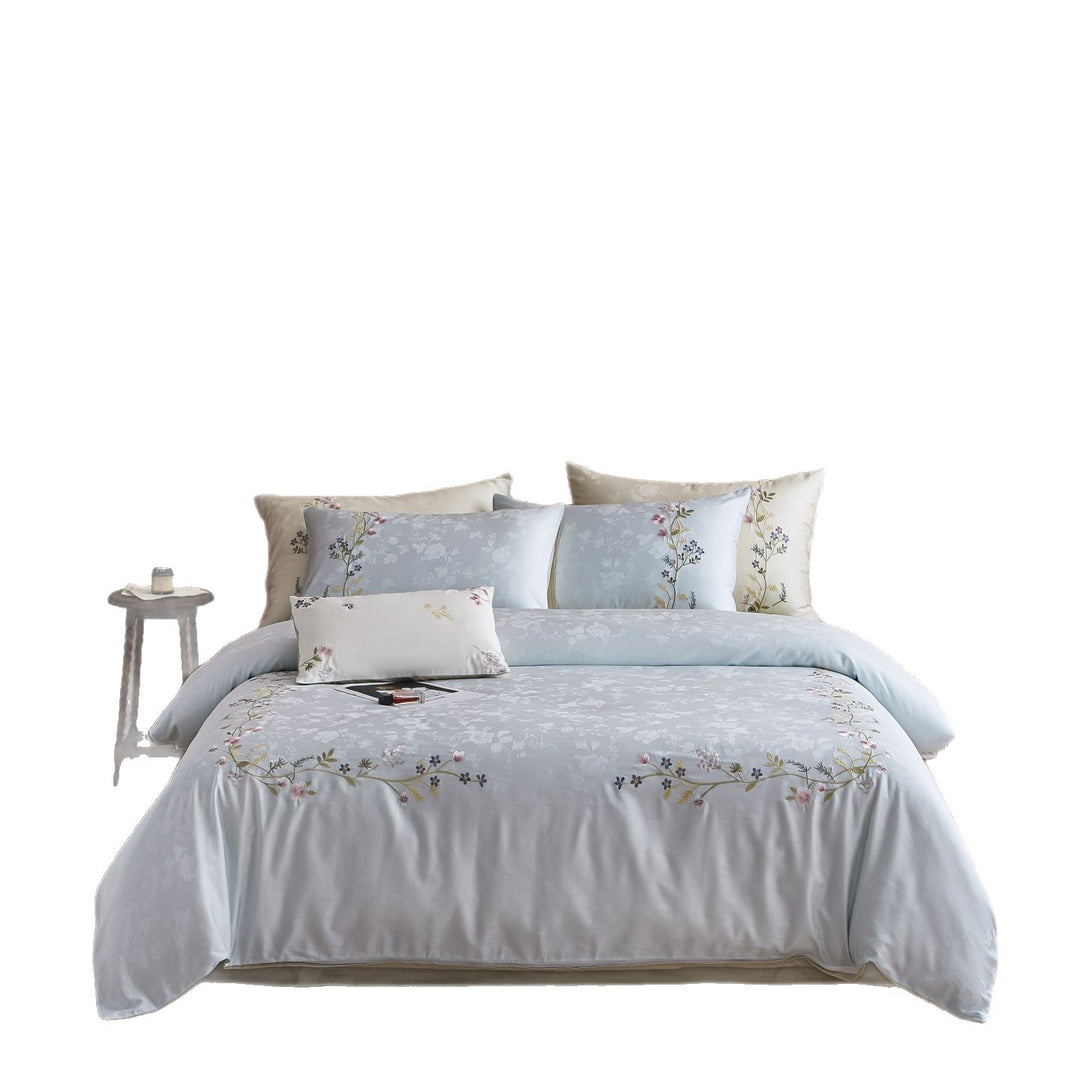 Satin bedding set with fine floral embroidery and jacquard structure