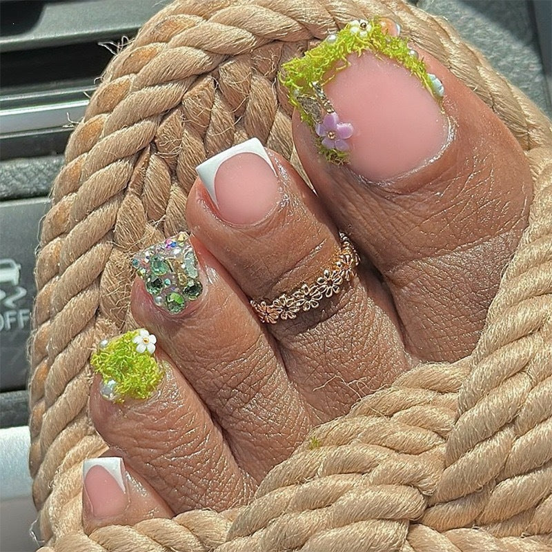 Artificial nail set with floral 3D details and glitter embellishments Stornfield