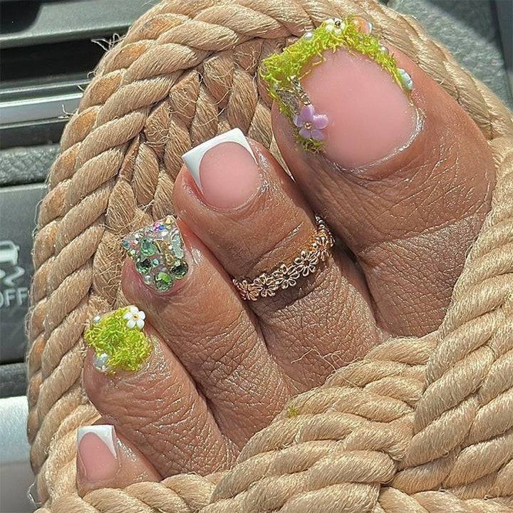 Artificial nail set with floral 3D details and glitter embellishments Stornfield