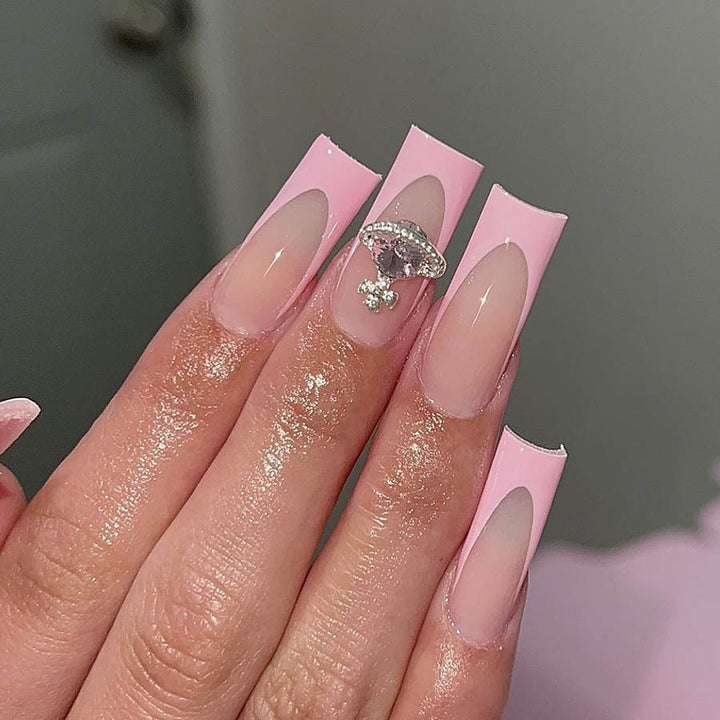 Acrylic nail set with luxurious floral and rhinestone decorations Stornfield
