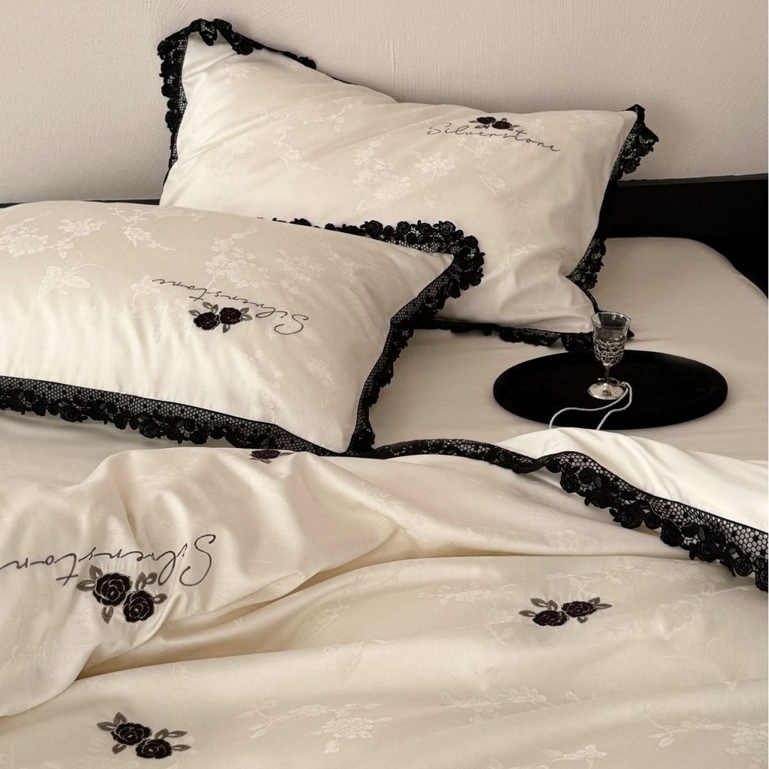 Luxurious cotton satin bedding set with lace border and rose embroidery