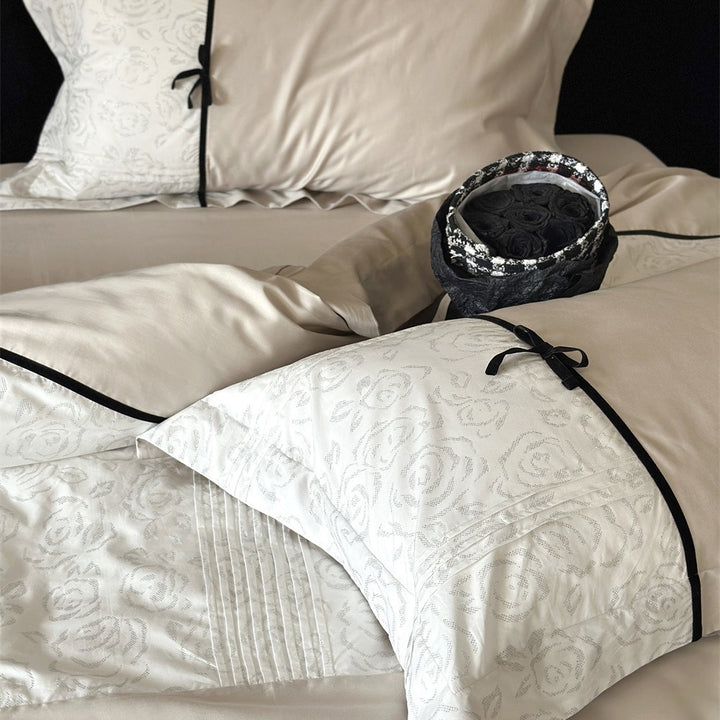 Reversible Duvet Cover Bedding Set with Quilted Jacquard Panel, Black Piped Trim & Decorative Bow Shams