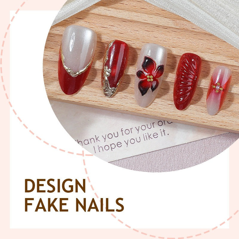 Acrylic nail set with floral design and elegant glitter details Stornfield