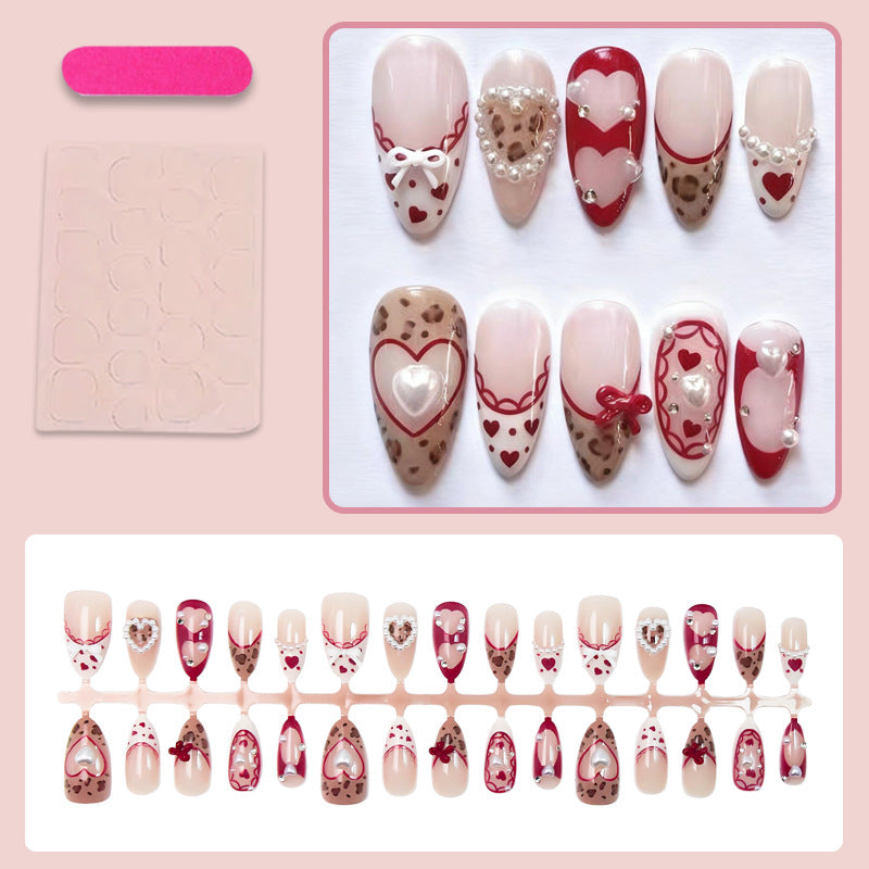 Nail set with romantic heart and bow decorations Stornfield