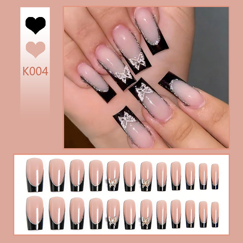 Glamorous artificial nails with detailed decorations Stornfield