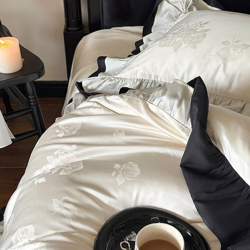 Luxurious cotton satin bedding set with decorative ruffle and contrasting edge finishing