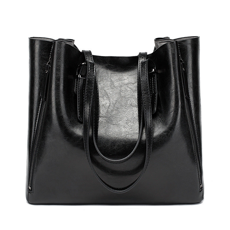 Versatile Leather Tote Bag with Zippered Pockets