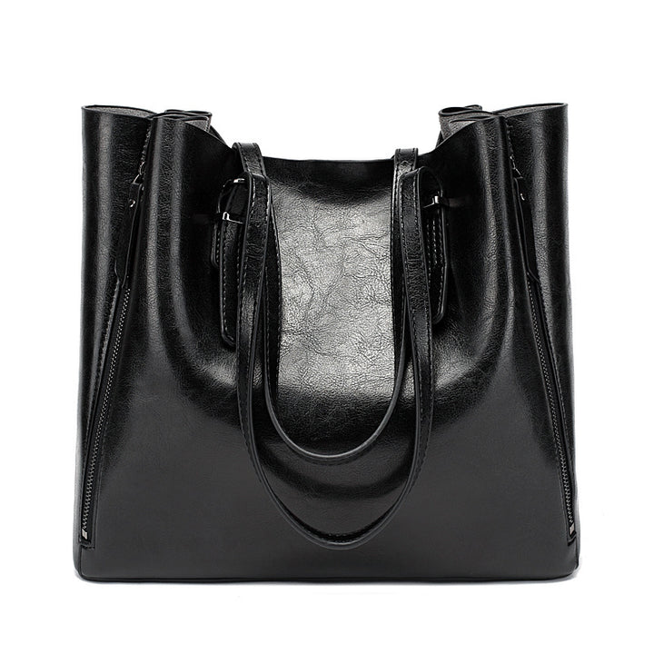 Versatile Leather Tote Bag with Zippered Pockets